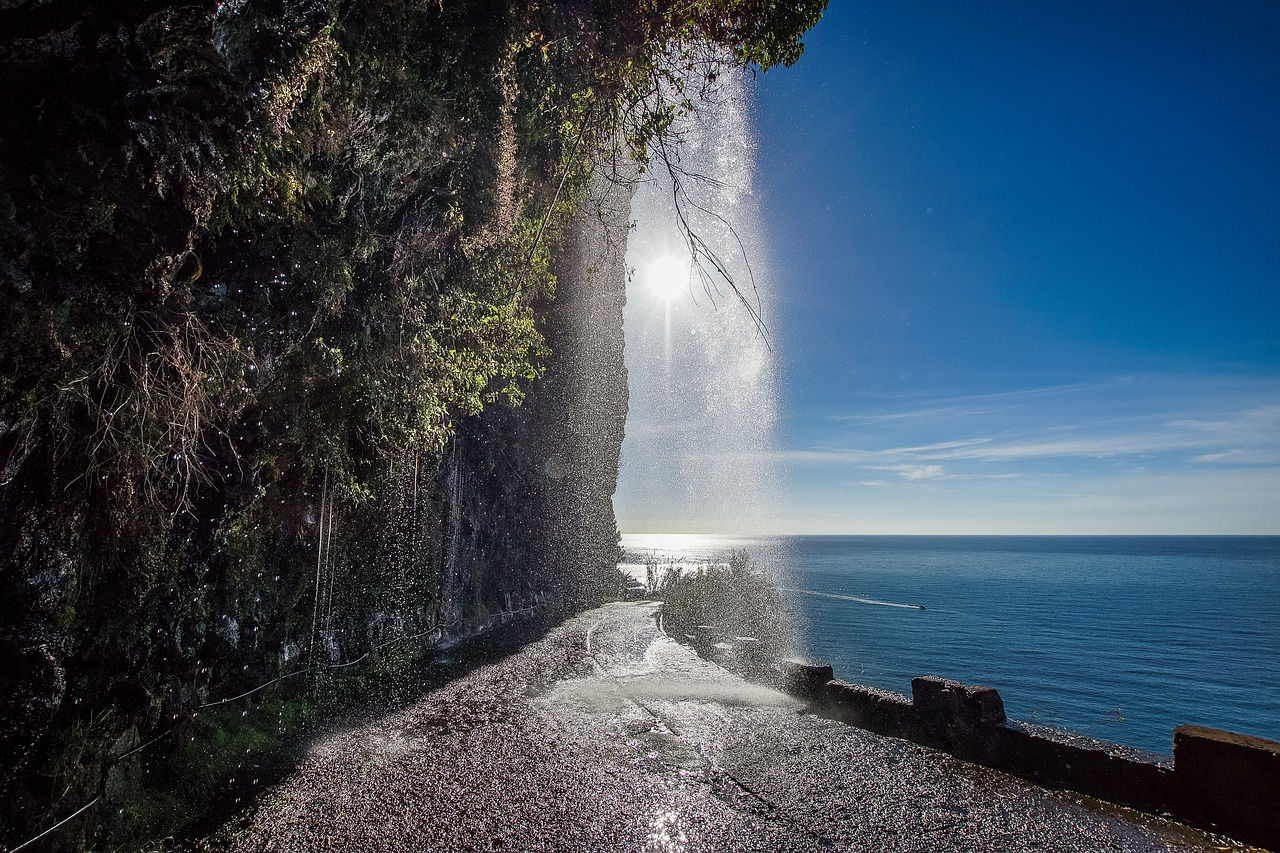 The dos Anjos waterfall spilling over the road 