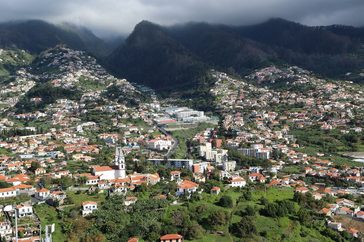 village in Madeira, with the mountain behind